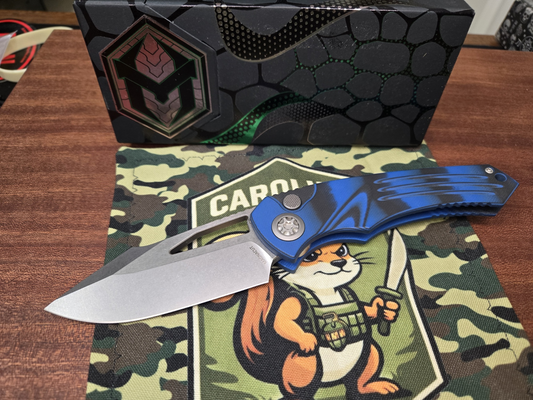 PRE-OWNED Heretic Pariah Manual Drop Point - MagnaCut Stonewash Blade - Blue & Black G10 Chassis